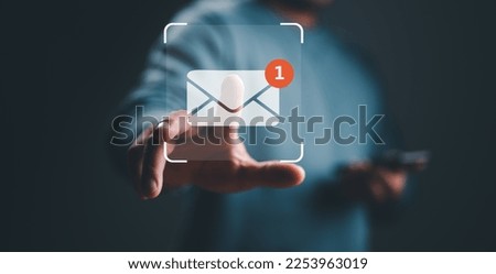 New email notification concept for business e-mail communication and digital marketing. Inbox receiving electronic message alert. business people touch on email in virtual screen. internet technology. Royalty-Free Stock Photo #2253963019