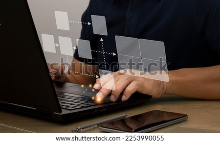 Businessman using laptop with email icon, online communication concept, coordination, online transaction. Royalty-Free Stock Photo #2253990055