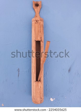 Kentongan is one of the traditional communication tools on Java islands made of wood, bamboo  coconut tree trunks, which have a cavity or resonance to cause loud votes. Traditional tools from Java, I