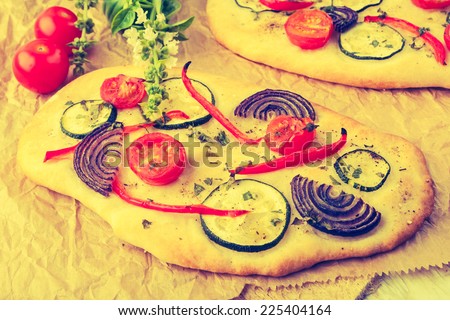 vintage photo of small homemade vegetarian pizza