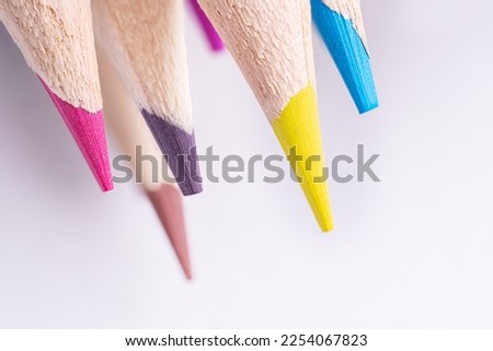 Macro photography of colored pencils. Blurred perspective. Mechanical sharpening of pencils. Art concept