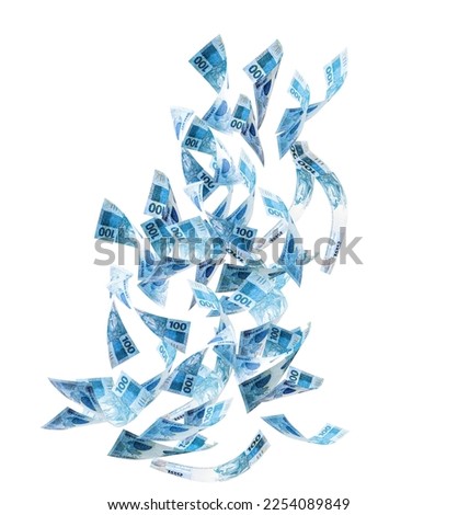 One hundred Brazilian banknotes falling on white isolated background. Concept of fortune, wealth, money rain or big luck.