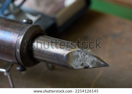 A large soldering iron used for special wires Royalty-Free Stock Photo #2254126145