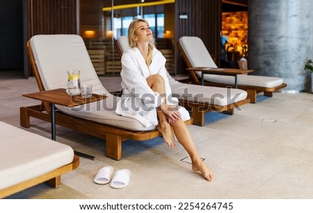 Beautiful woman relaxing in a beauty spa hotel - Client having a beauty treatment in a beauty spa salon, female adult having a relaxing day in hot spring bath