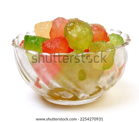 Delicious Sweet Pumpkin Pieces colorful Petha sweet in a bowl.