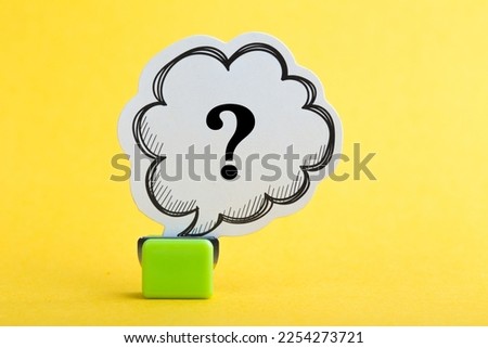 Question mark speech bubble of business concept on yellow background.