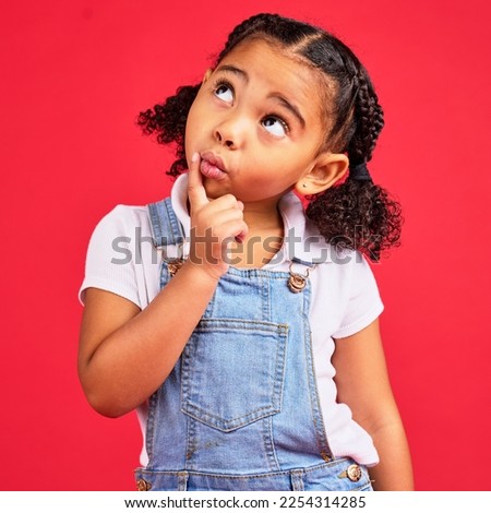 Little girl, ideas or thinking face by isolated red background in games innovation, question or planning vision. Kid, expression or curious finger on chin, children fashion clothes or curly hairstyle Royalty-Free Stock Photo #2254314285