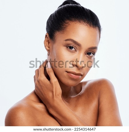 Beauty portrait, skin care and face of woman in studio for dermatology, cosmetics and natural makeup. Aesthetic model with hand on body for spa facial and healthy glow isolated on a white background