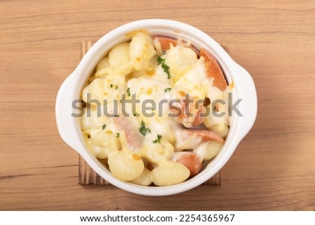 Grilled potato gnocchi and wiener cheese