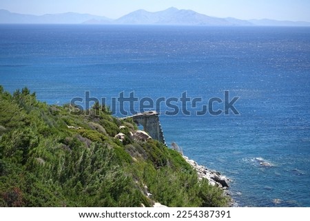 Photo from Icarus rock a place where Icarus fell to the sea, Ikaria island, North Aegean sea, Greece Royalty-Free Stock Photo #2254387391
