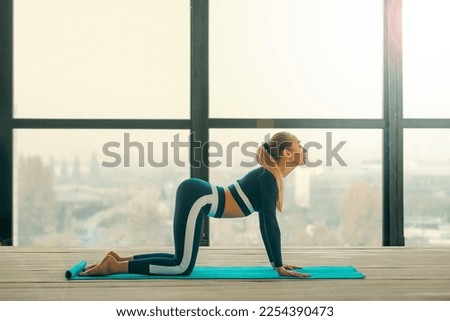 Download cover for music collection for yoga classes. Yoga asana Indoor. Sports recreation. Beautiful young woman in yoga pose. Individual sports.