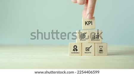 Effective and smart key performance indicators (KPIs) to measure and evaluate progress. Specific, measurable, achievable, realistic, timely. Tracking performance, setting goals and making decisions. Royalty-Free Stock Photo #2254406599