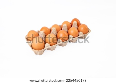 10 eggs carton pack, isolated on white background Royalty-Free Stock Photo #2254450179