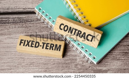 Fixed-Term Contract symbol. Concept words Fixed-Term Contract on wooden blocks. Royalty-Free Stock Photo #2254450335