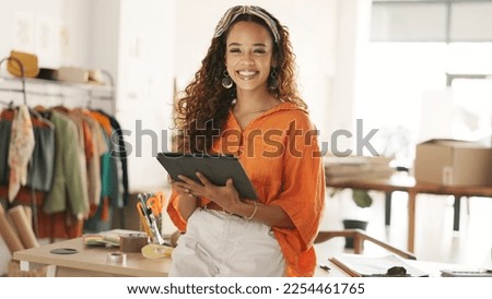 Tablet, design and shipping an online order with woman sending a package using the internet from her office. Creative, technology and logistics with a female entrepreneur at work in her studio Royalty-Free Stock Photo #2254461765