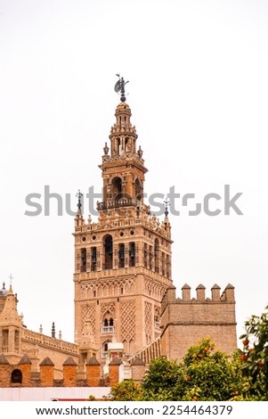 La Giralda is the bell tower of Seville Cathedral. It was originally built as the minaret for the Great Mosque of Seville during the reign of the Almohad dynasty.