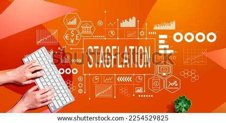 Stagflation theme with person using a computer keyboard