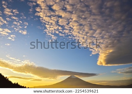 Mt. Fuji and the sky at dusk with a clouds.