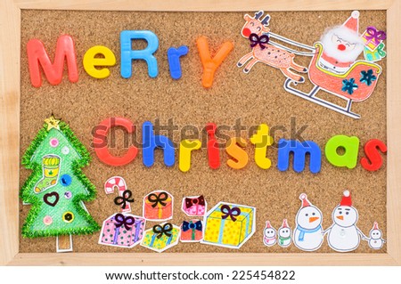 Drawing and coloring Christmas theme with word "Merry christmas" decorate on cork board