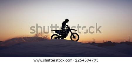 Motorcycle, sport and silhouette of man on bike at night, sky and background in nature. Fitness sports, exercise biking or motorbike person driving on dirt sand, hill mountain or desert for health