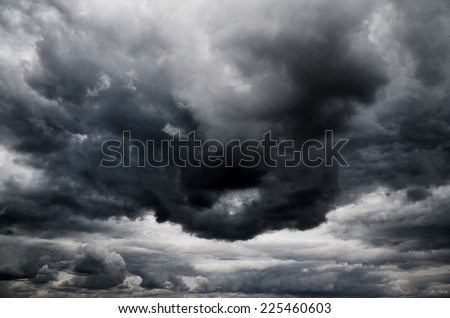 dark storm clouds before rain Royalty-Free Stock Photo #225460603