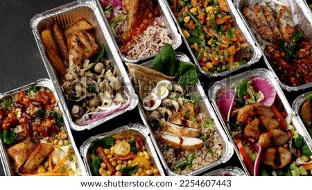 Ramadan Family Iftar Boxes. Takeaway Iftar Box. Hot Halal meals for the poor and the needy, Food Donation Royalty-Free Stock Photo #2254607443