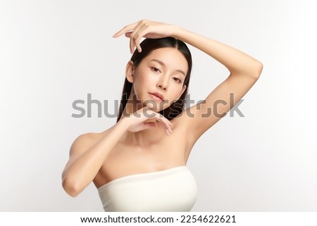 Beautiful young asian woman with clean fresh skin on white background, Face care, Facial treatment, Cosmetology, beauty and spa, Asian women portrait. Royalty-Free Stock Photo #2254622621
