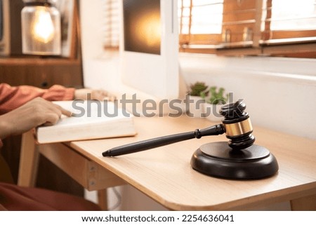 Asian muslim woman learning court of law and justice Trial Session: Imparcial Honorable Judge Pronouncing Sentence, striking Gavel, Close up