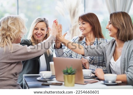 Picture of hands together on business meeting