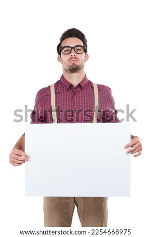 Banner, man and portrait in studio with blank, advertising and space or billboard on white background. Face, paper and mock up by handsome guy with poster, marketing and confident, cool and isolated