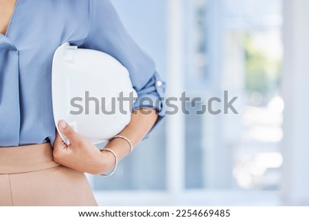 Woman, hands and helmet for construction safety, building or contractor ready for a job on site at office. Hand of female employee engineer or builder holding white hard hat for safe work security Royalty-Free Stock Photo #2254669485