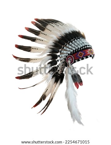 Indian headdress Western Ethnic Large feathers of various colors were tied together with cloth and animal skins strung together with colorful beads isolated on white background. This has clipping path