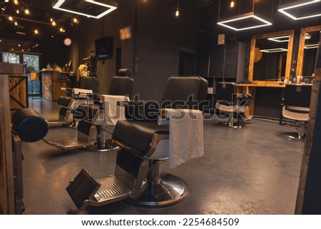 Picture of a luxury barbershop with nice interior Royalty-Free Stock Photo #2254684509