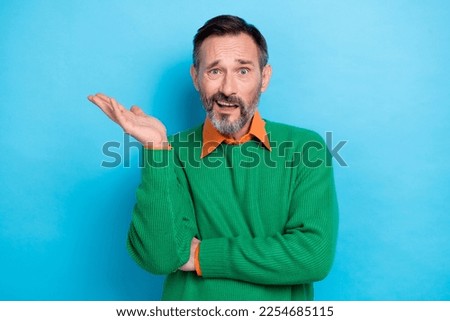 Photo portrait of mature handsome man arguing irritated face annoyed raise palm wear trendy green garment isolated on blue color background Royalty-Free Stock Photo #2254685115