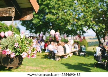 Blurred background of summer garden party, rural birthday or wedding celebration