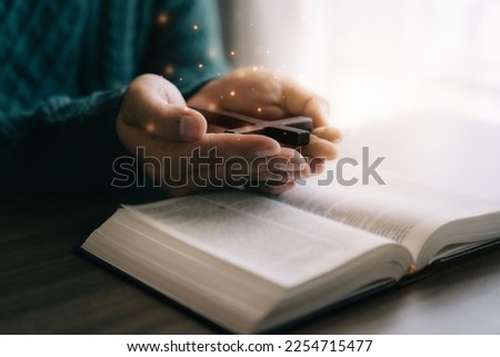 man is reading the scripture or holy bible. God's teachings according to belief and faith in God. Royalty-Free Stock Photo #2254715477