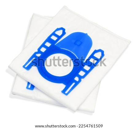 New dust bag for vacuum cleaner isolated on white background Royalty-Free Stock Photo #2254761509