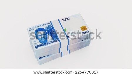 3 piles of new1000 Naira notes isolated on white background view Royalty-Free Stock Photo #2254770817