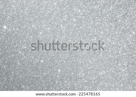 Glittery silver background texture perfect for Luxury, fashion or Christmas and holiday season designs. Royalty-Free Stock Photo #225478165