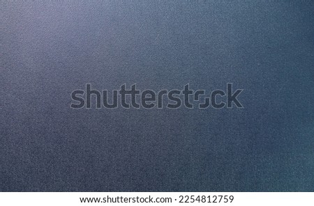 Dark plastic background. Photo of the texture of gray plastic. Material for production.