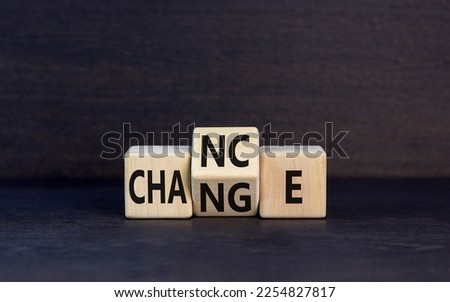 Chance and change symbol. Concept word Chance Change on wooden cubes. Beautiful black table black background. Business and chance and change concept. Copy space.