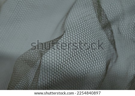 Hexagonal Mesh Waves on a White Background Photo.