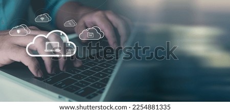 Cloud computing technology and data storage concept, for enterprise or entrepreneur, businessperson using laptop to access cloud system, data center, cybersecurity network or financial and business. Royalty-Free Stock Photo #2254881335