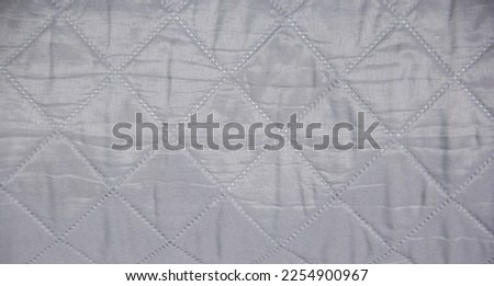 Simple gray cloth fabric pattern textured background with empty copy space for wallpaper and texts