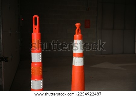 construction cones middle of street roadblock danger orange 