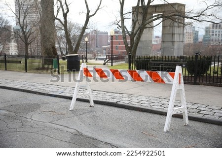 construction cones middle of street roadblock danger orange 
