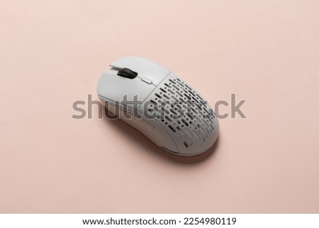 white new wireless computer mouse flat lay with led lights