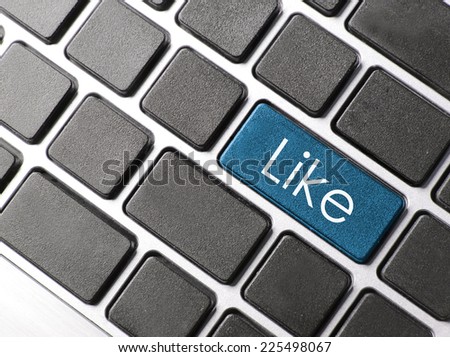 Enter button with Like on computer keyboard background