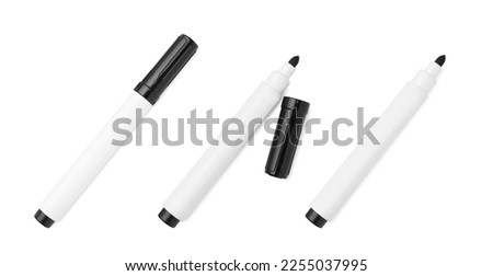 Set of black markers on white background, top view. School stationery Royalty-Free Stock Photo #2255037995