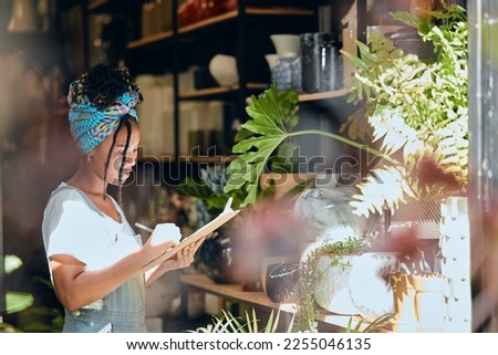 Checklist, small business or black woman writing flowers for plants quality control or stock inventory. Agro management, store manager or entrepreneur planning or working on floral growth inspection